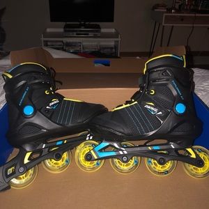 Black yellow and blue roller blades